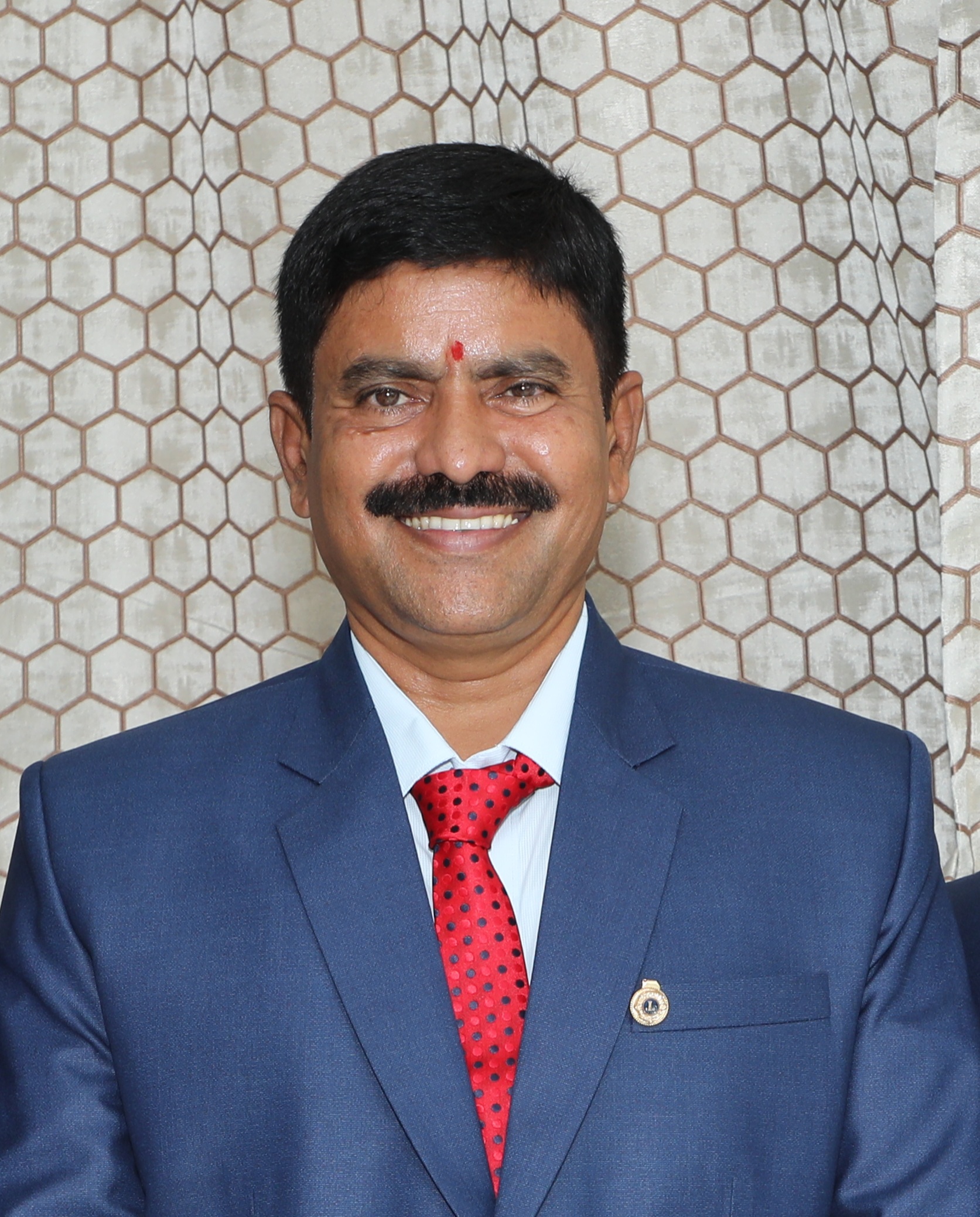 Suresh D R